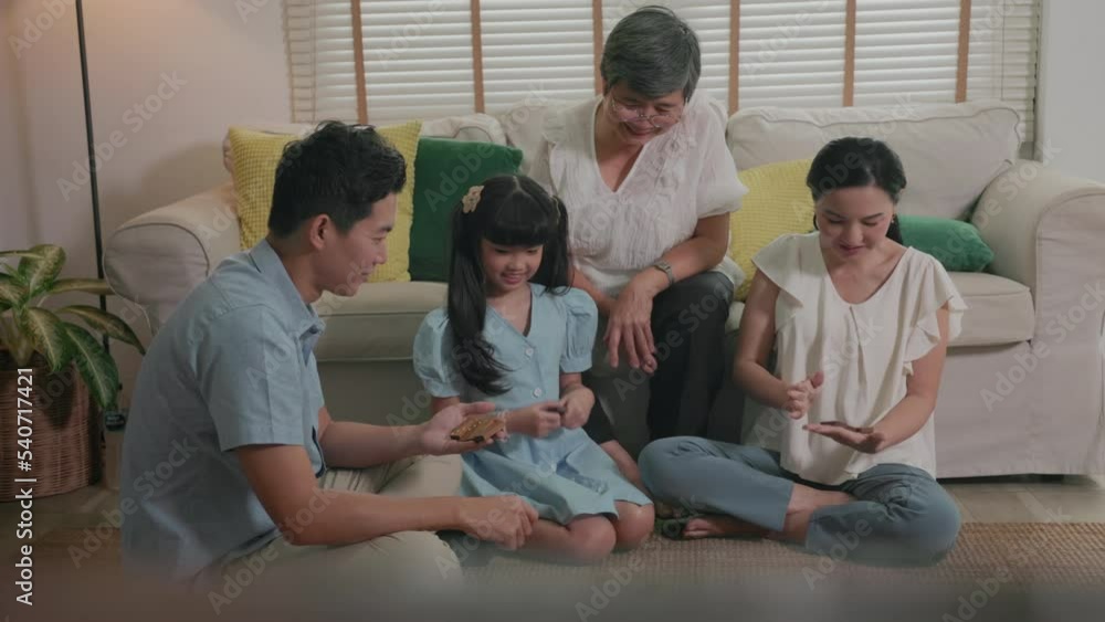 Three Generations of Big Family Spending Time Together in Living Room Three Generations of Big Family Spending Time Together in Living Room
