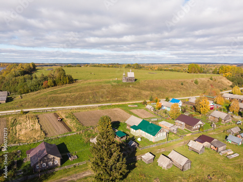 Temple on the hill. Chapel of St. Nicholas in the village of Vershinino. Russia, Arkhangelsk region photo