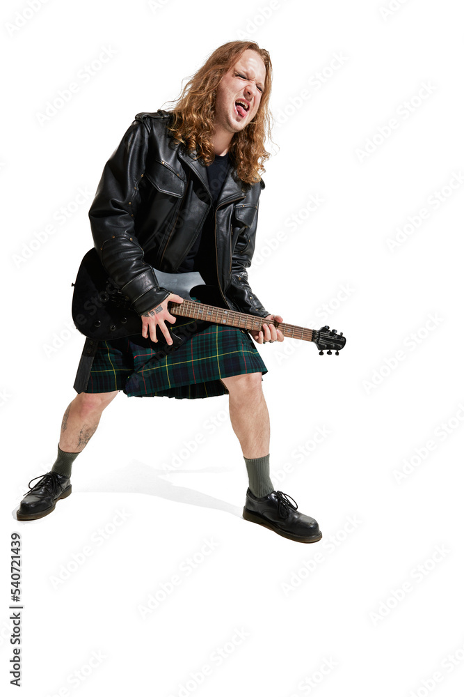 Portrait of expressive young man with long hair, rock musician playing guitar, posing over white background Portrait of expressive young man with long hair, rock musician playing guitar, posing over white background