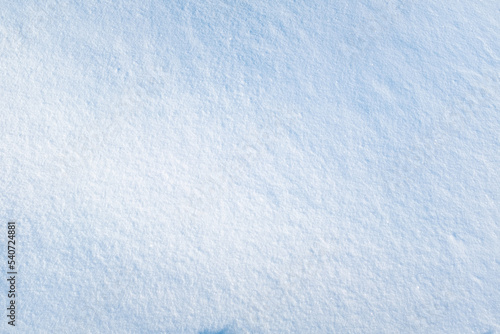 Snow background, top view. Fresh snow texture for publication, poster, screensaver, wallpaper, postcard, banner, cover, post. High quality photography