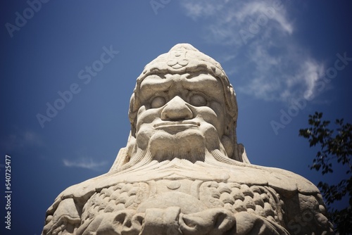 Sculpture outside the King Kong throne of Zhenjue temple, Wuta temple, Beijing - closeup shot photo