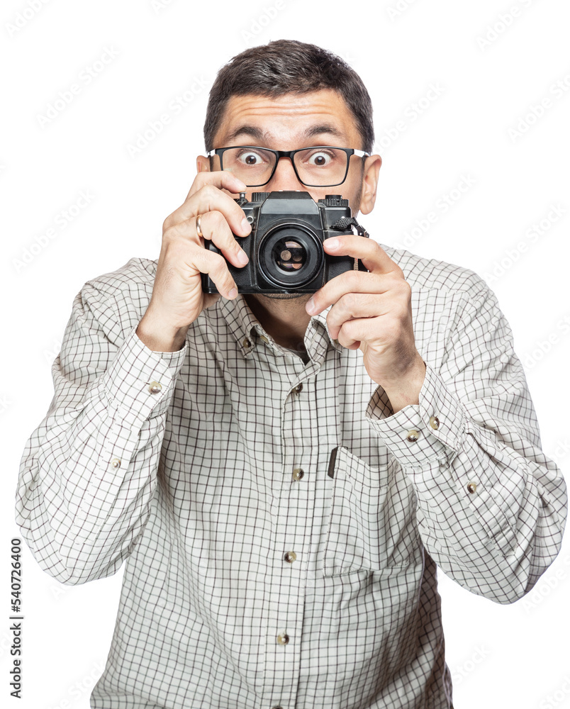 Handsome man in glasses and a plaid shirt, smiling and taking pictures with an vintage camera Handsome man in glasses and a plaid shirt, smiling and taking pictures with an vintage camera