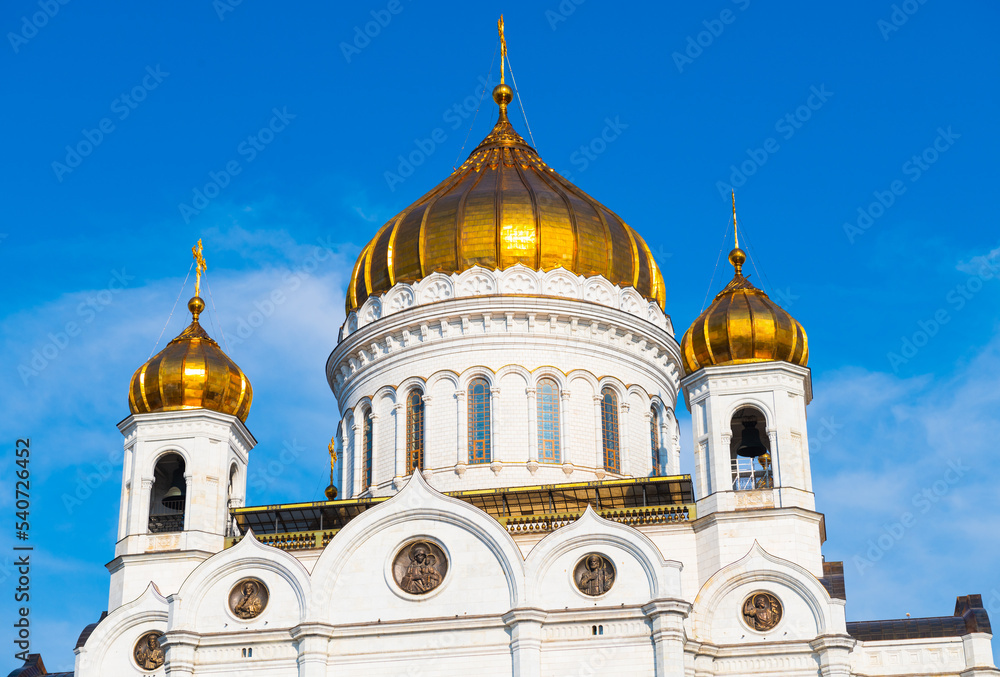 Domes of the Cathedral of Christ the Saviour. Sunny summer morning. Moscow. Russia