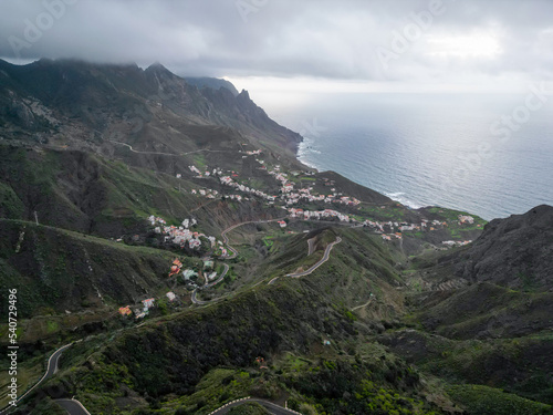 Aerial landscape photo of a beautiful coastal town between mountains at sunset. Taganana, Tenerife