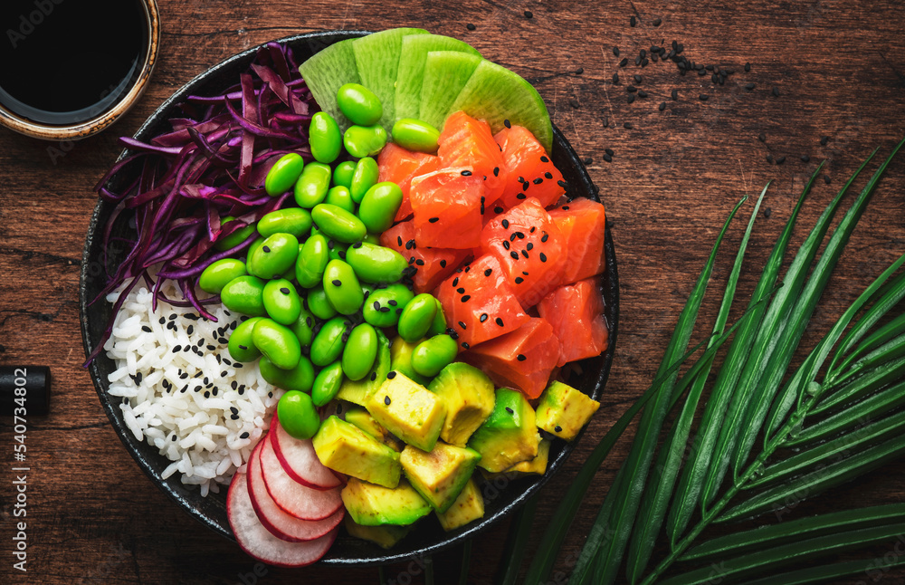 Hawaiian poke bowl with salmon, avocado, radish, edamame beans, red ...