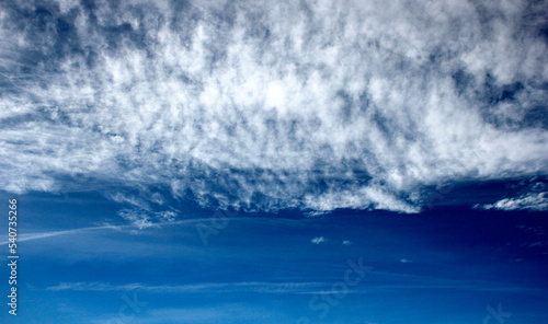 blue sky with clouds background in blue and white, texture of the clouds, blue sky background with white clouds
