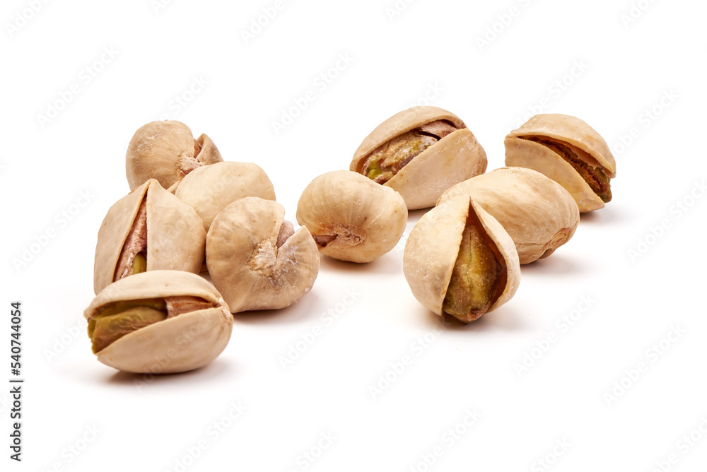 Heap of pistachios isolated on white background. Heap of pistachios isolated on white background.