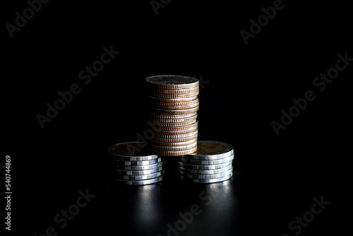 Wallpaper Mural Stack of coins on black background, Saving money concept Torontodigital.ca