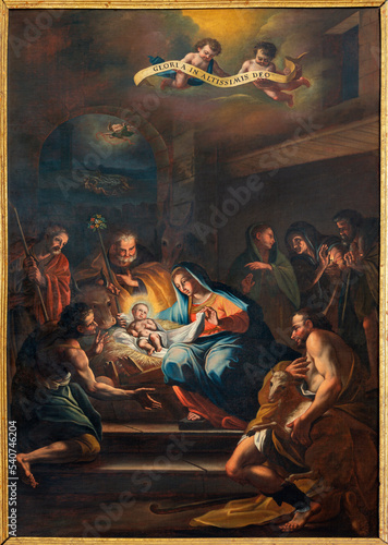 BOLETO, ITALY - JULY 19, 2022: The painting of Nativity - Adoration of shepherds in the church Santuario della Madonna del Sasso by unknown artist of 18. cent.
