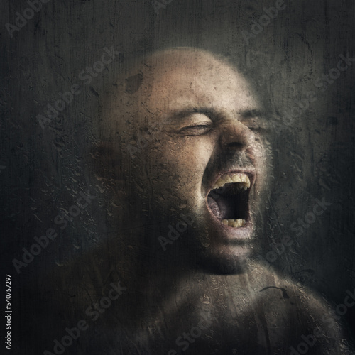 portrait of a man with face screaming