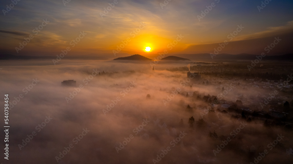 Obraz premium Fantastic view over cloud inversion sunrise mountains cityscape landscape