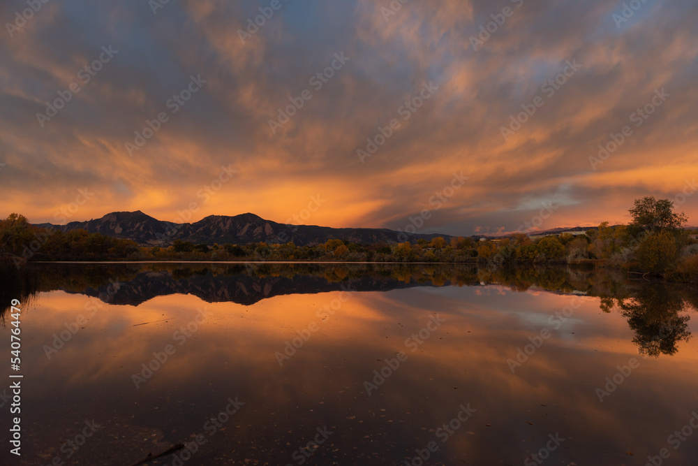 Sunrise with a lake reflection in Boulder, Colorado