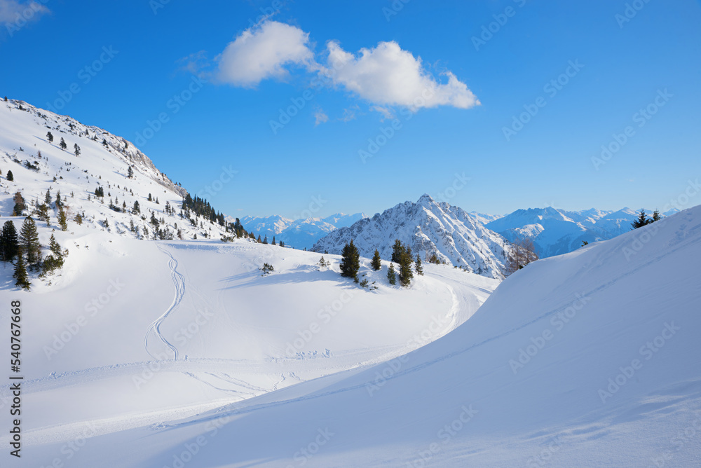 dreamy winter landscape with snow covered slope, ski resort Rofan alps