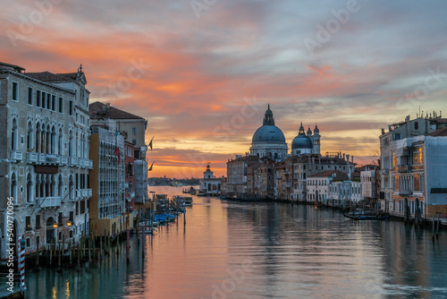 Sunrise  over the Grand Canal, in Venice, Italy, looking towards the majestic Basilica di Santa Maria della Salute © parkerspics