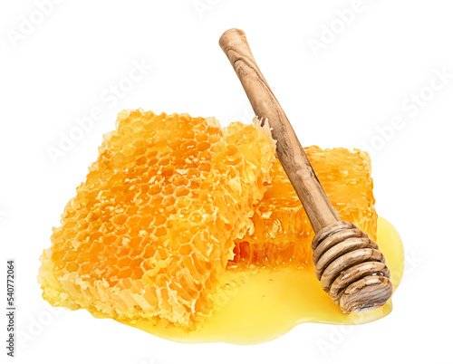 Honey isolated on white or transparent background.  Honeycomb and honey dipper with puddle of honey.