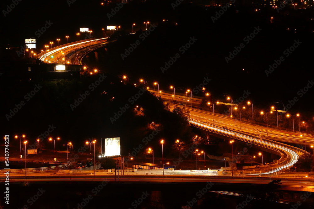 Night-lit large intersection on the highway ring, Barrandovský most in Prague
