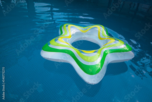 inflatable circle in a swimming pool with clear water © Alernon77