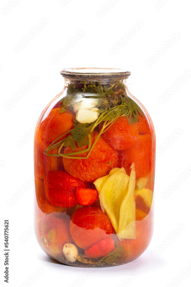 Glass jar with canned tomatoes on a white background Glass jar with canned tomatoes on a white background