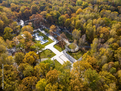 Dąbrowa Górnicza Aerial View. Park Zielona ( Green Park ) at Autumn Time. Top Down View of Autumn Forest with Green and Yellow Trees. Upper Silesia Province, Poland.