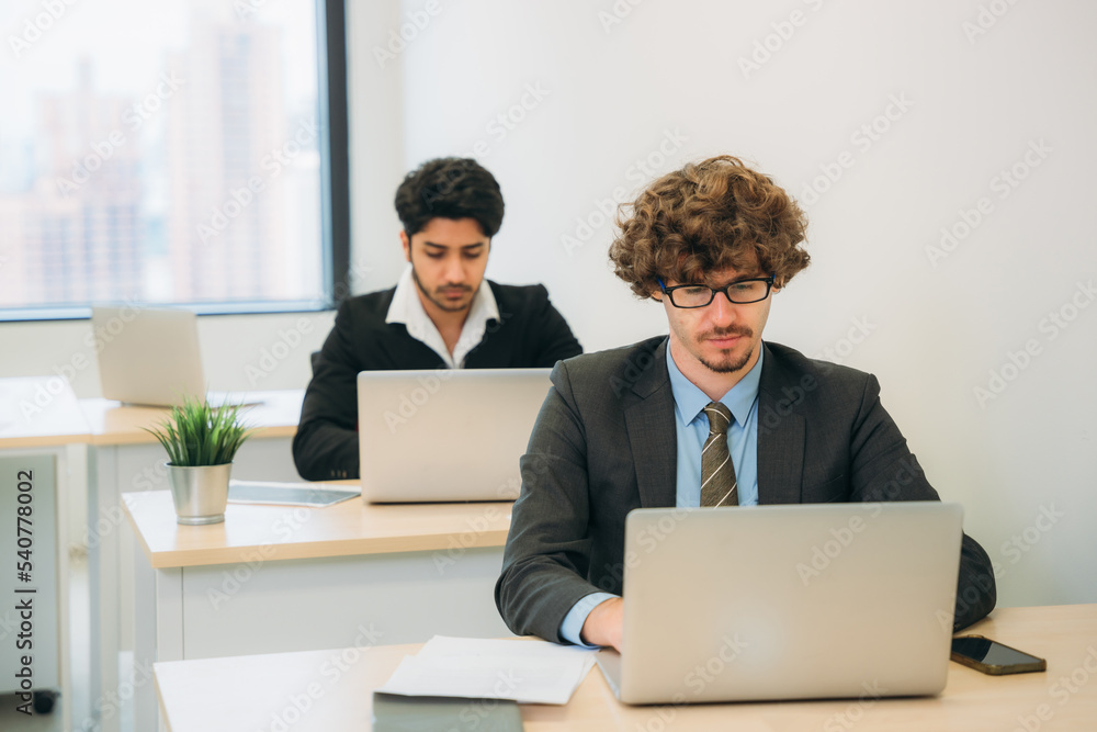 People in business holding a meeting, conference, and discussion about the future and their profits at the office. People in business holding a meeting, conference, and discussion about the future and their profits at the office.