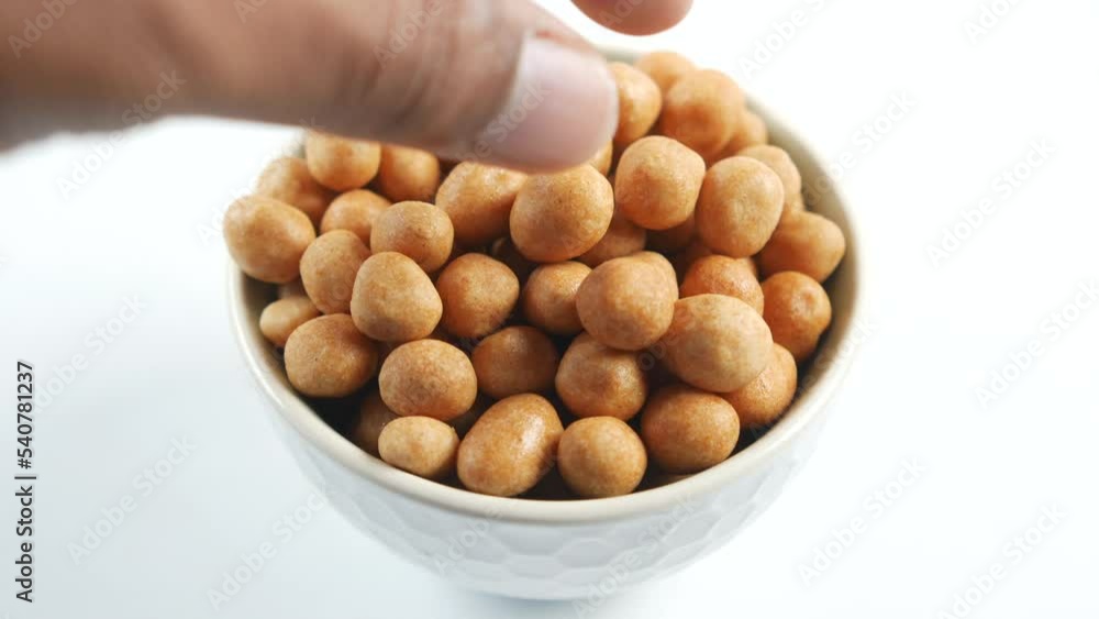 indonesia peanuts in a bowl on table top down . indonesia peanuts in a bowl on table top down .