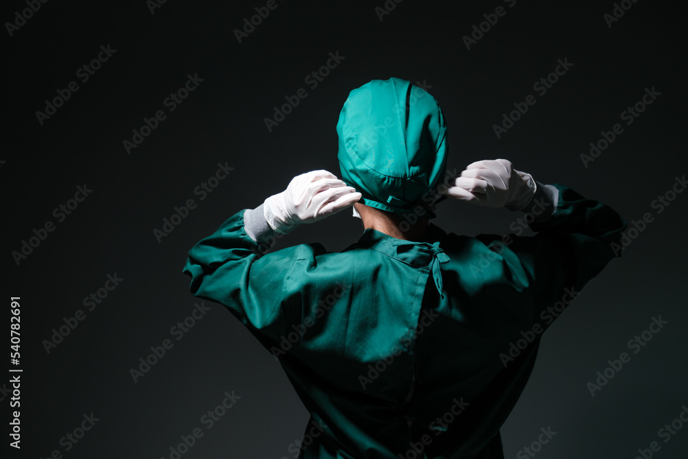 Female doctor surgeon wearing scrub overall suit for medical surgery
