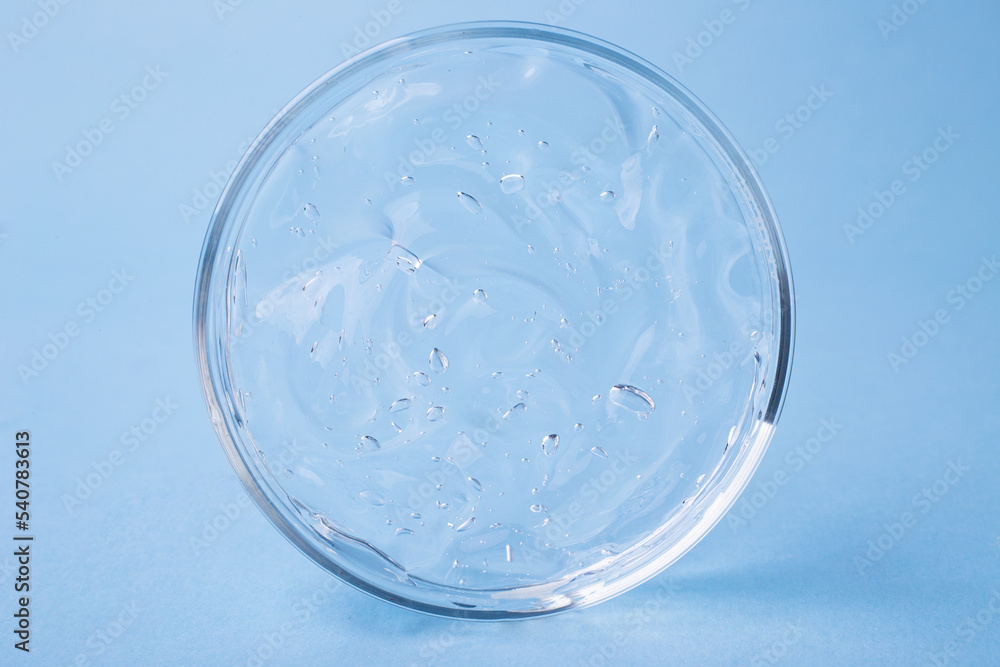 Closeup photography of cosmetics gel with bubbly structure in the petri dish.Cosmetics banner with copy space. Closeup photography of cosmetics gel with bubbly structure in the petri dish.Cosmetics banner with copy space.