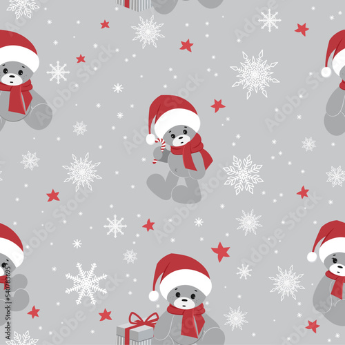 Cute Christmas pattern with teddy bears in Santa hats and snowflakes. Seamless vector pattern. It is well suited for wrapping paper.