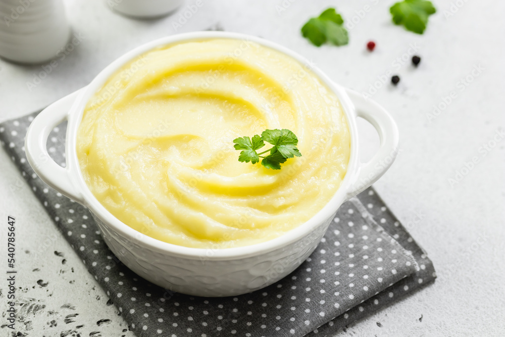 Garlic white bean mash in a bowl. Top view, copy space, flat lay. Garlic white bean mash in a bowl. Top view, copy space, flat lay.