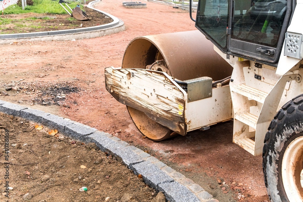 Vibration roller compactor at road construction and repairing asphalt ...