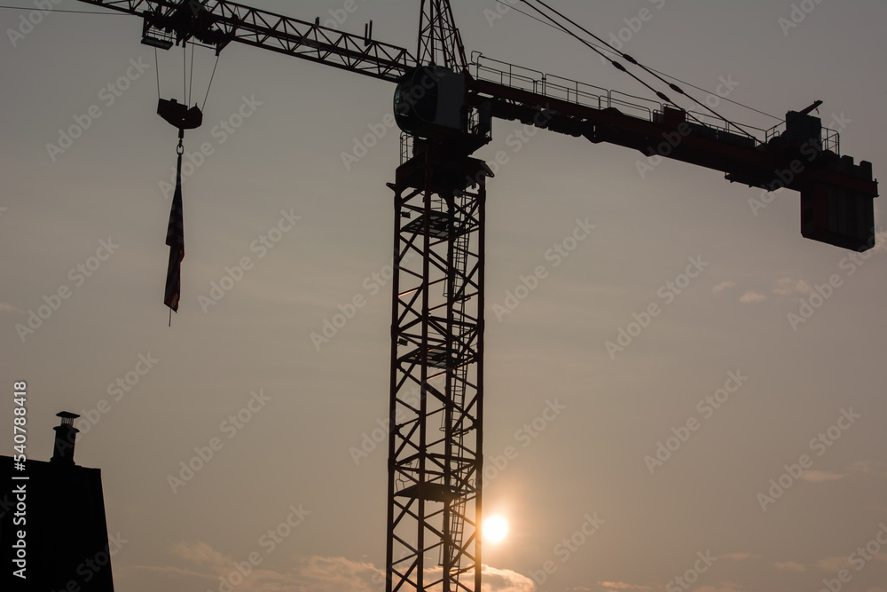 crane silhouette building in downtown Renton, Washington sunrise
