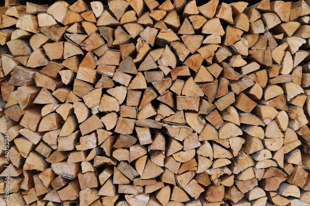 stacked dry firewood as a background stacked dry firewood as a background