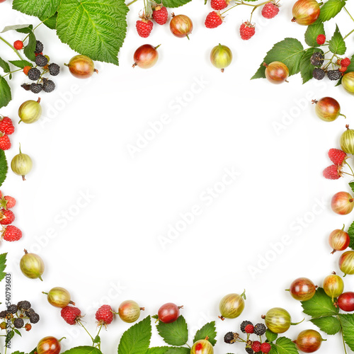 Berries of raspberry and gooseberry isolated on white background. Original frame with free space for text.