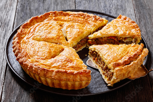 Photos Ground Beef Meat Pie on dark wooden table