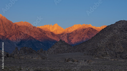 Alabama Hills National Scenic Area, looking west, with the Sierra Nevada in the background, shown in Lone Pine, California, United States. photo