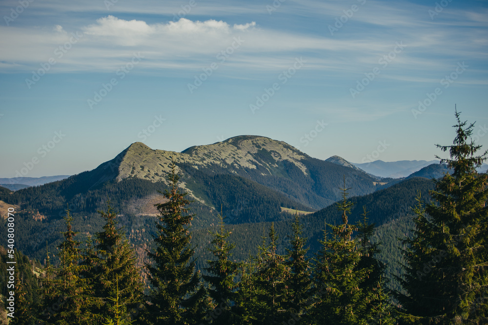 Autumn mountain landscape with a view of the top. Autumn mountain landscape with a view of the top.