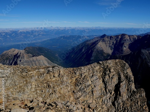 Columbia valley with Canadian Rockies with Mount Assiniboine in the background view at the summit of Mount Ethelbert