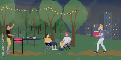 Friends resting at barbecue party in evening