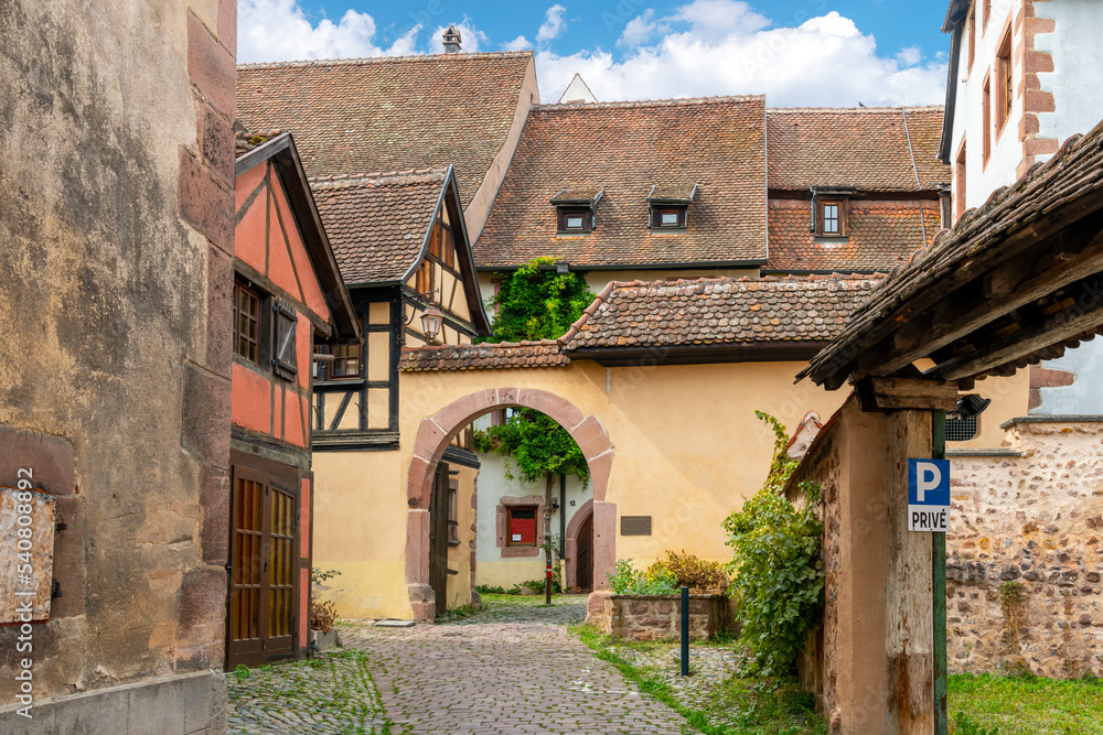 The Court of the Bishops of Strasbourg in the medieval village of Riquewihr, France, one of the stops along the wine route in the Alsace region.