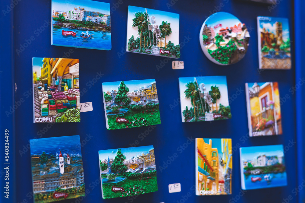 View of traditional tourist souvenirs and gifts from Kerkyra, Corfu island, Ionian sea, Greece, fridge magnets with text 