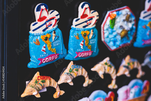 View of traditional tourist souvenirs and gifts from Kerkyra, Corfu island, Ionian sea, Greece, fridge magnets with text 