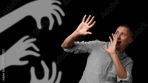 Scared man having panic att...