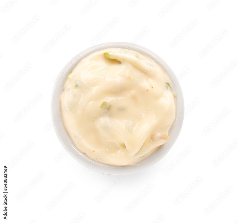Caesar salad dressing in bowl on white background Caesar salad dressing in bowl on white background