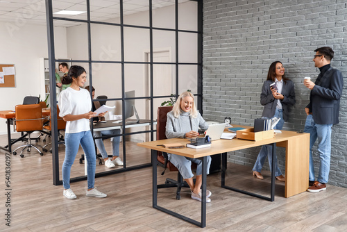 Co-workers having business meeting in office