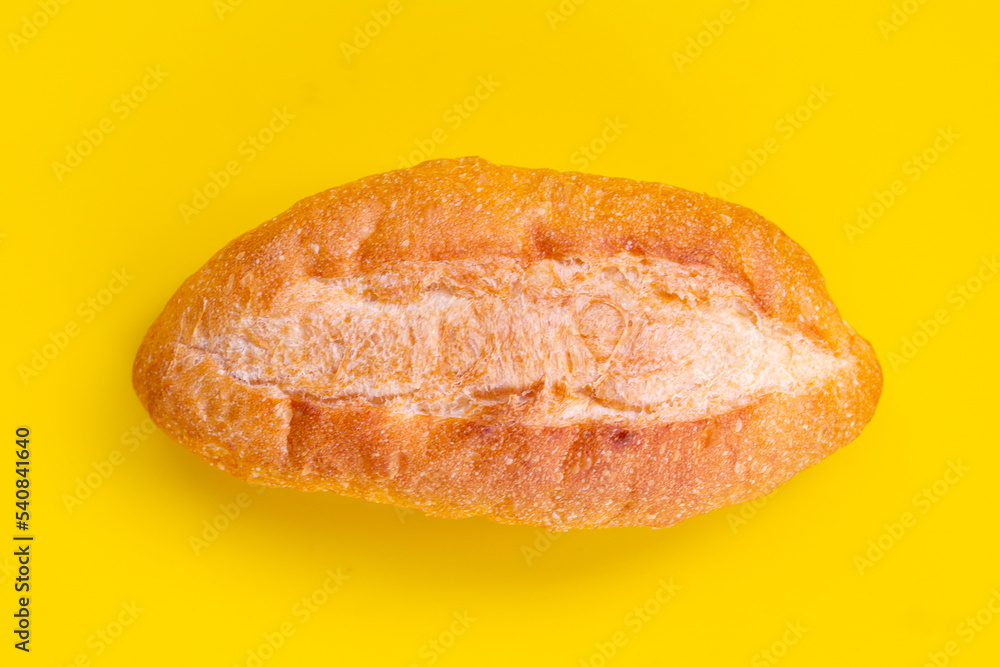 Bread isolated on yellow background