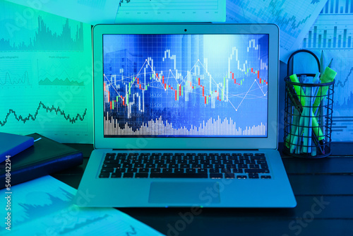 Laptop displaying stock mar...