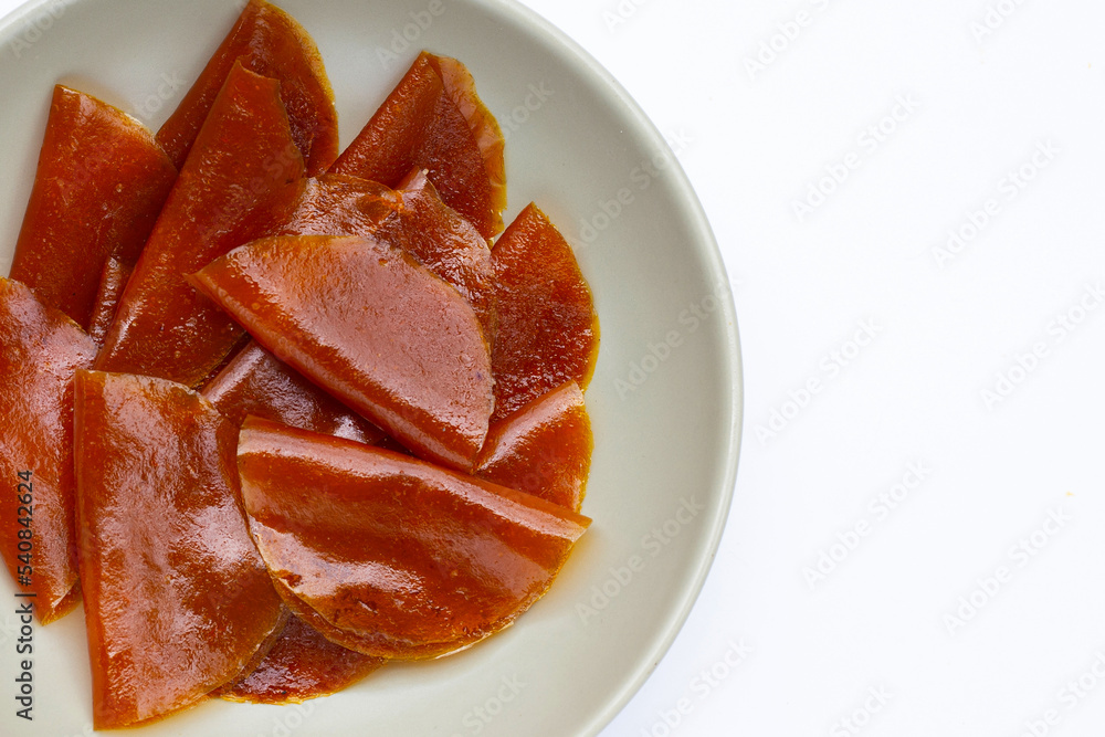 Dried mango paste sheets on white background. Dried mango paste sheets on white background.