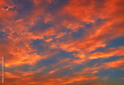 Beautiful sunset sky background with bold colors © Davis Brown
