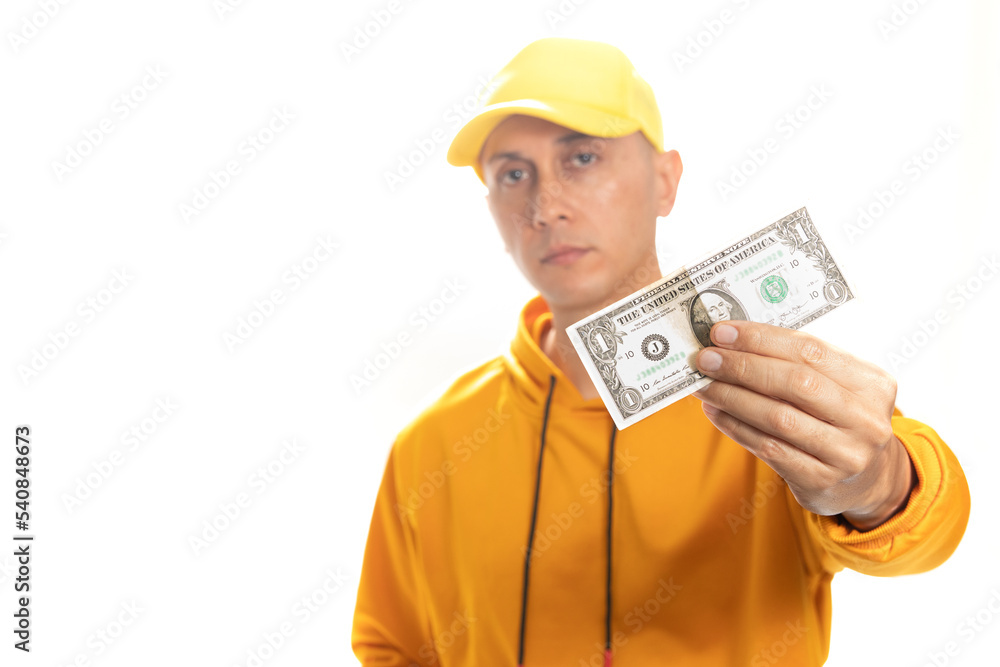 Latin man holding a dollar Latin man holding a dollar