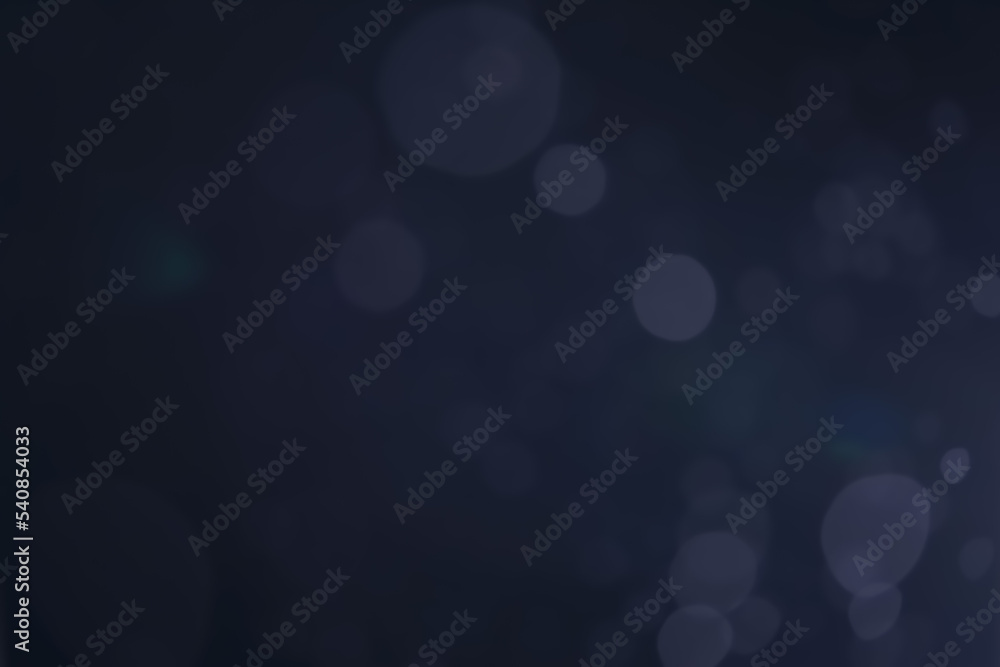 A dark blue background bokeh image for used to decorate background. A dark blue background bokeh image for used to decorate background.